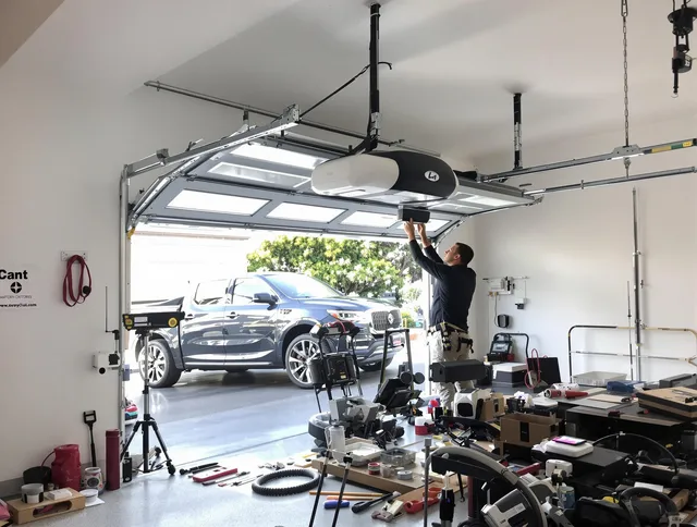 Wadsworth Garage Door Repair specialist installing smart garage door opener system in Wadsworth home