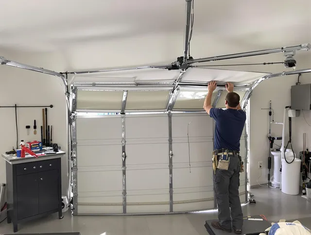 Wadsworth Garage Door Repair specialist performing precise section replacement on Wadsworth garage door